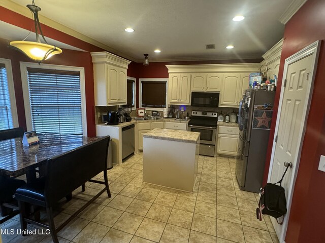 kitchen featuring light tile patterned flooring, decorative backsplash, ornamental molding, a kitchen island, and stainless steel appliances