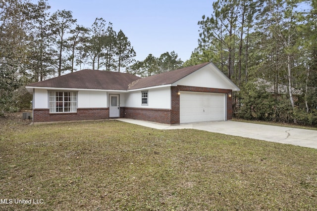 single story home featuring a garage and a front lawn