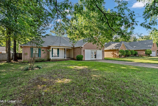 single story home with a front yard