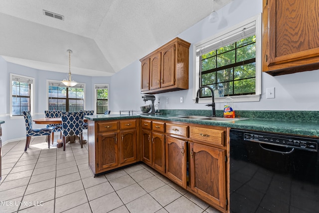 kitchen featuring a textured ceiling, black dishwasher, sink, and vaulted ceiling