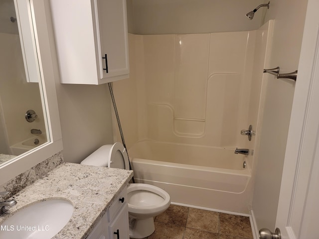 bathroom with vanity, toilet, and shower / bath combination