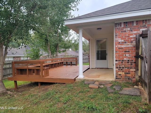 wooden deck featuring fence