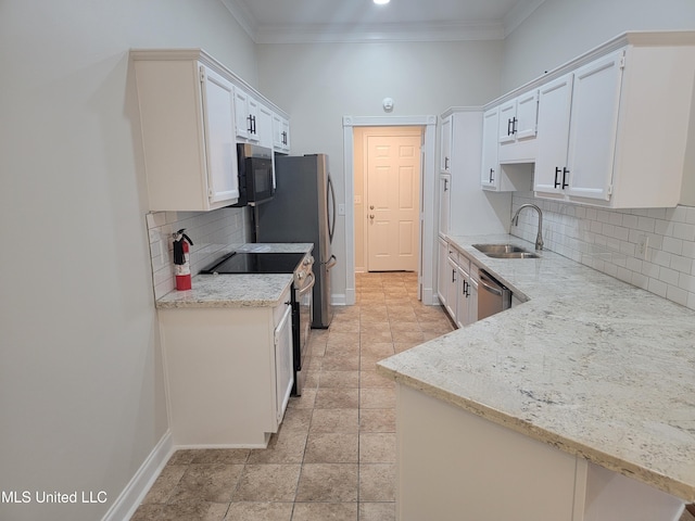 kitchen featuring ornamental molding, light stone countertops, stainless steel appliances, and a sink