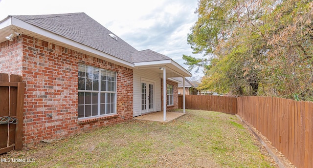 4954 Brookwood Pl, Byram, MS 39272 - fenced backyard with french doors and a patio