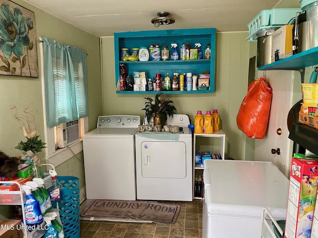 clothes washing area featuring laundry area and washer and dryer