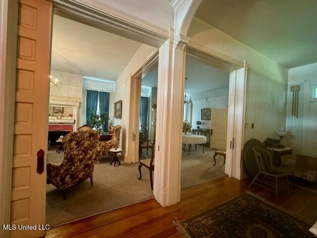 206 Linton Ave, Natchez, MS 39120 - interior space featuring decorative columns and wood finished floors
