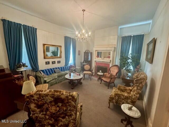 206 Linton Ave, Natchez, MS 39120 - living area with a chandelier and carpet