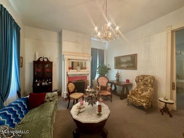 206 Linton Ave, Natchez, MS 39120 - sitting room featuring a chandelier and carpet