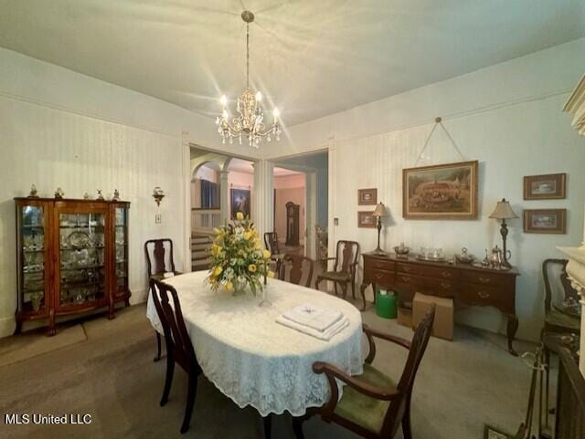 206 Linton Ave, Natchez, MS 39120 - carpeted dining room featuring a chandelier