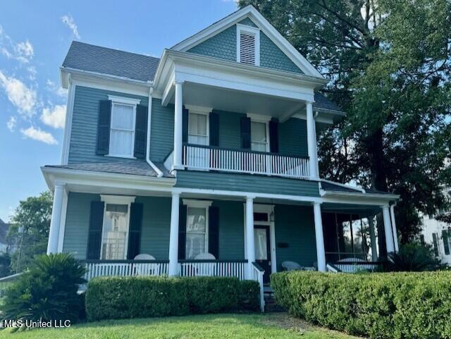 206 Linton Ave, Natchez, MS 39120 - view of front of house featuring covered porch and a balcony
