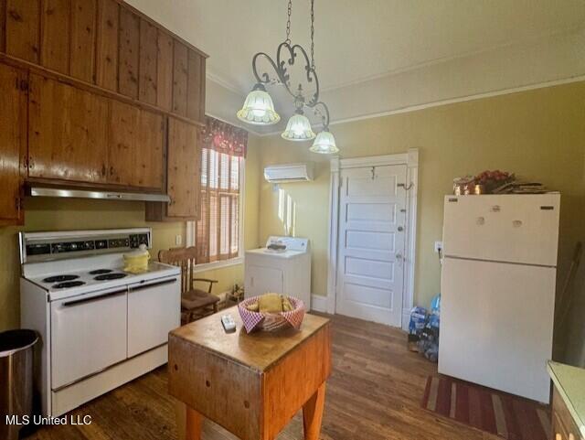 206 Linton Ave, Natchez, MS 39120 - kitchen with white appliances, washer / dryer, under cabinet range hood, dark wood-style floors, and a wall mounted AC