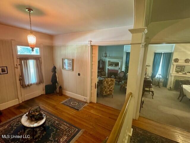 206 Linton Ave, Natchez, MS 39120 - foyer entrance featuring wood finished floors, baseboards, and ornate columns