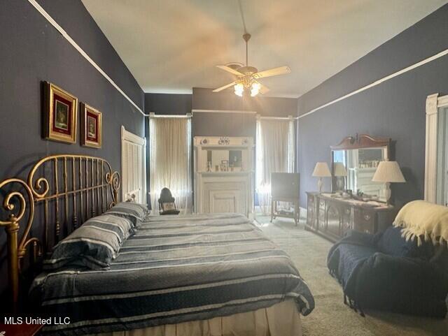 206 Linton Ave, Natchez, MS 39120 - bedroom featuring carpet floors and ceiling fan