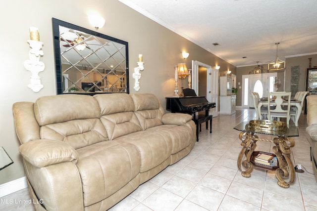 701 S Hill Ct, Biloxi, MS 39532 - living room featuring light tile patterned flooring and crown molding