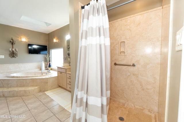 701 S Hill Ct, Biloxi, MS 39532 - bathroom with tile patterned flooring, a bath, vanity, and a tile shower