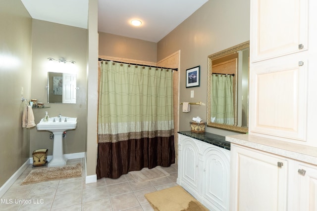 701 S Hill Ct, Biloxi, MS 39532 - full bathroom featuring tile patterned floors and curtained shower