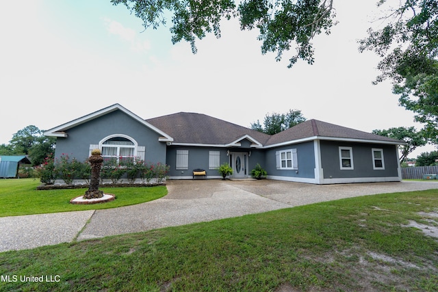 701 S Hill Ct, Biloxi, MS 39532 - ranch-style house with a front lawn and stucco siding