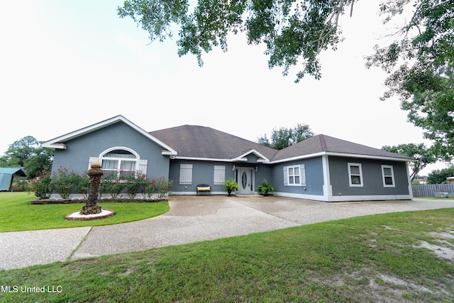 701 S Hill Ct, Biloxi, MS 39532 - single story home with a front yard, concrete driveway, and stucco siding