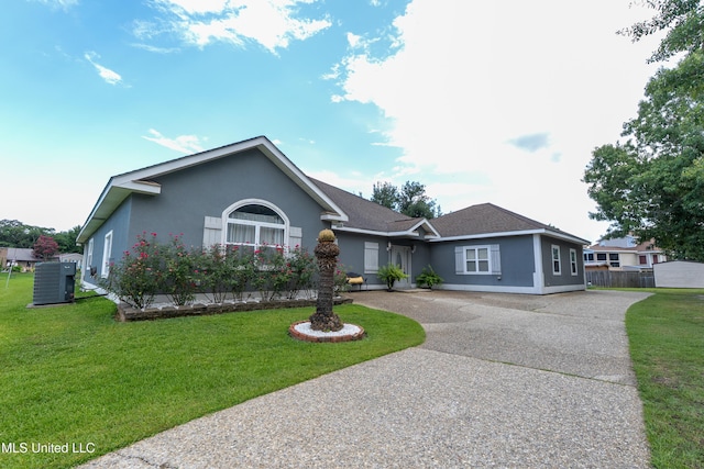 701 S Hill Ct, Biloxi, MS 39532 - ranch-style house with concrete driveway, stucco siding, and a front lawn