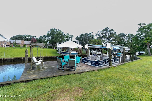 701 S Hill Ct, Biloxi, MS 39532 - dock area featuring a water view and a lawn