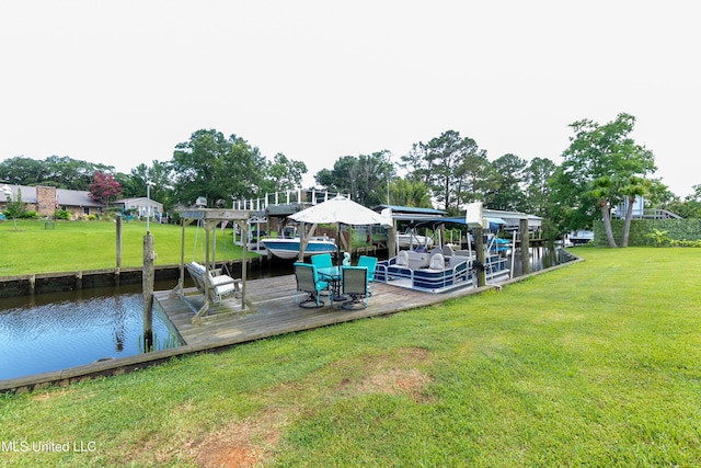 701 S Hill Ct, Biloxi, MS 39532 - dock area with a water view, a lawn, and boat lift
