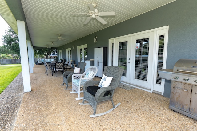 701 S Hill Ct, Biloxi, MS 39532 - view of patio with ceiling fan, an outdoor living space, area for grilling, and outdoor dining space