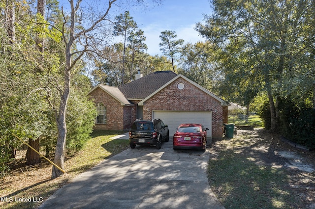 single story home featuring a garage