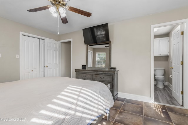 bedroom with dark wood-type flooring, a closet, ceiling fan, and ensuite bathroom