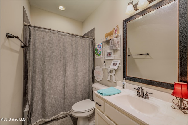 full bathroom featuring vanity, toilet, and shower / bath combination with curtain