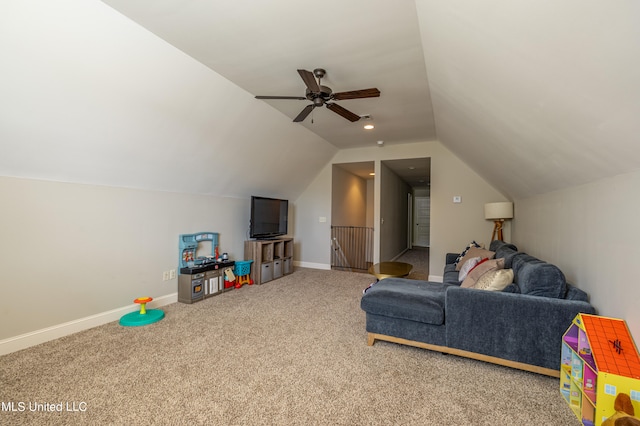 recreation room featuring ceiling fan, carpet flooring, and vaulted ceiling