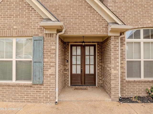 property entrance featuring french doors