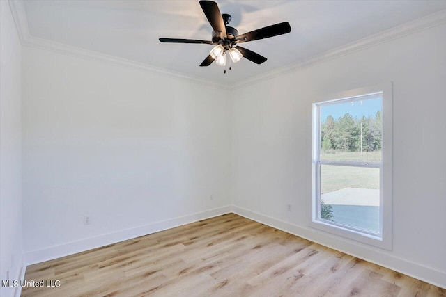 1025 Mullican Rd, Florence, MS 39073 - spare room with crown molding, baseboards, and light wood finished floors