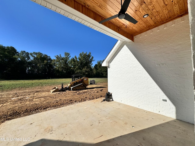 view of patio featuring ceiling fan