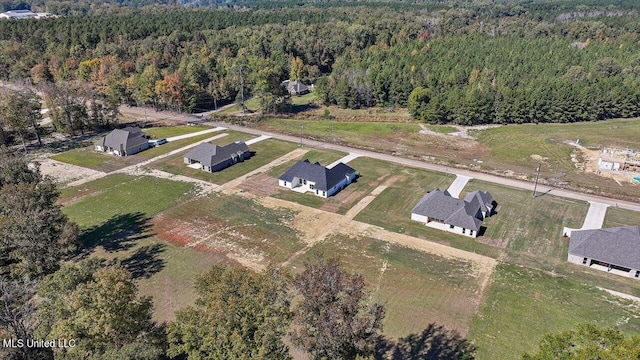 1025 Mullican Rd, Florence, MS 39073 - birds eye view of property featuring a wooded view