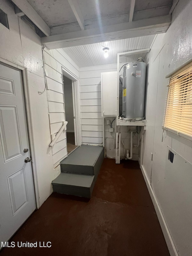 utility room featuring electric water heater