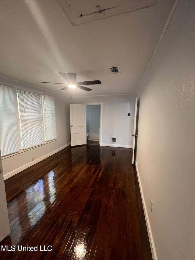 766 Monterey St A-B, Unit A-B Jackson, MS 39204 - unfurnished room with dark wood-type flooring, baseboards, and ceiling fan