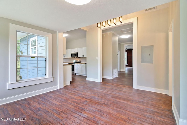 305 First Ave, New Augusta, MS 39462 - unfurnished living room with electric panel, dark wood-type flooring, and baseboards