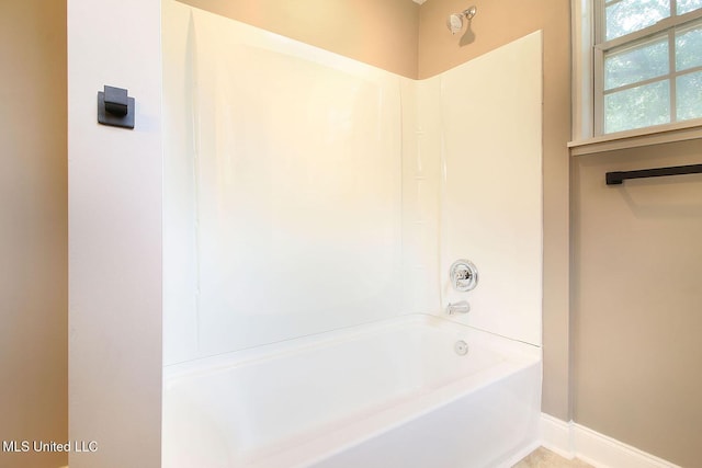 305 First Ave, New Augusta, MS 39462 - full bathroom featuring shower / tub combination and baseboards
