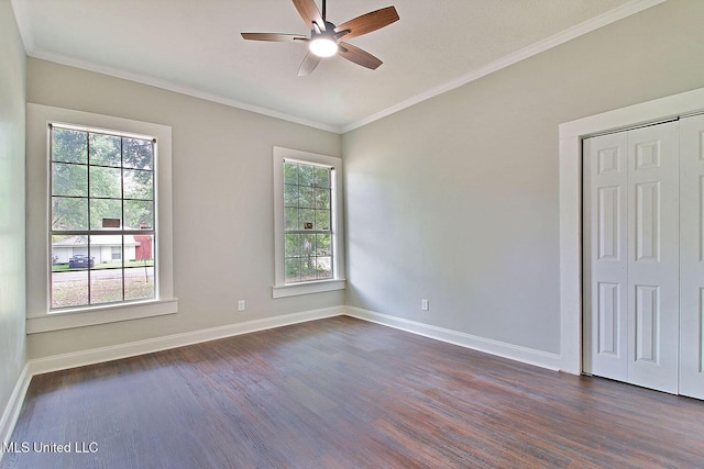 305 First Ave, New Augusta, MS 39462 - empty room with dark wood-style flooring, healthy amount of natural light, and ornamental molding