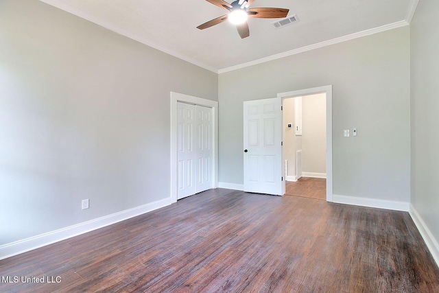 305 First Ave, New Augusta, MS 39462 - unfurnished room with ceiling fan, crown molding, dark wood finished floors, and baseboards
