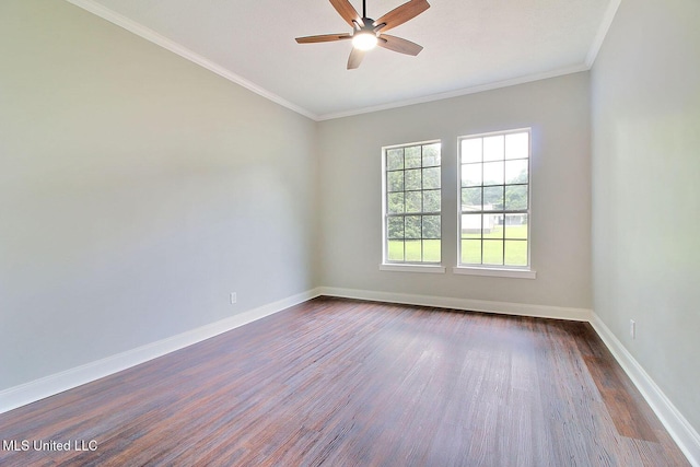 305 First Ave, New Augusta, MS 39462 - empty room with a ceiling fan, dark wood-type flooring, baseboards, and crown molding