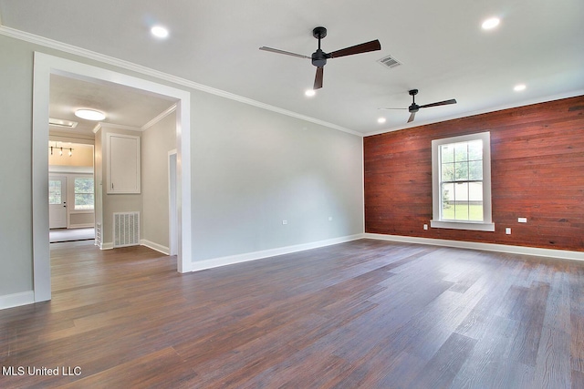 305 First Ave, New Augusta, MS 39462 - empty room featuring dark wood-type flooring, ceiling fan, baseboards, wood walls, and recessed lighting