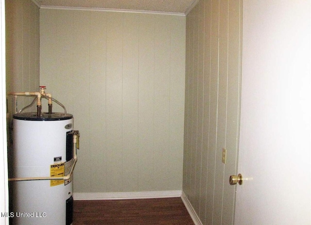 utility room featuring electric water heater