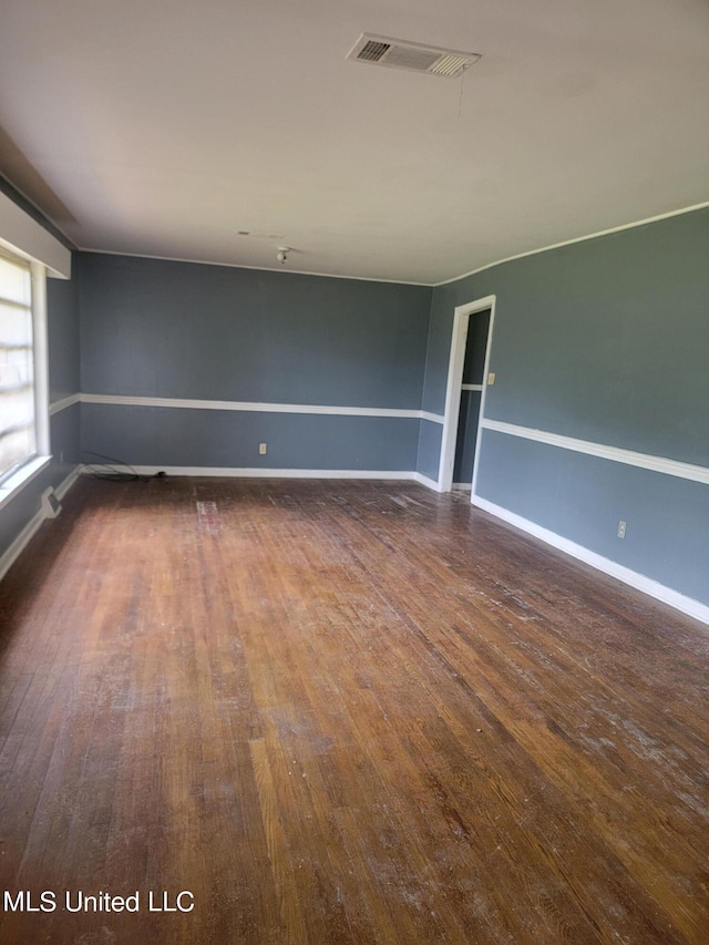 empty room featuring dark hardwood / wood-style floors