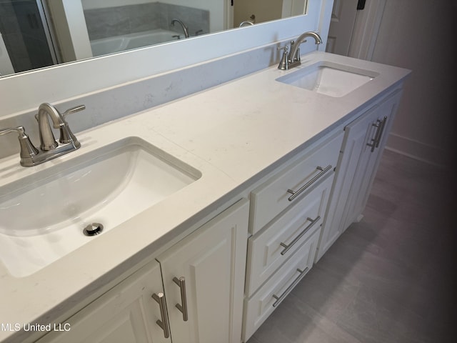 303 Birch Ct Lot 32, Canton, MS 39046 - full bathroom with double vanity and a sink