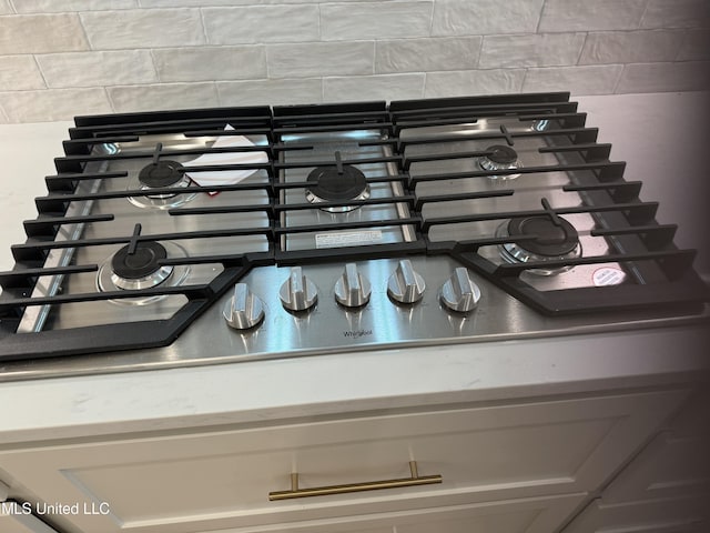 303 Birch Ct Lot 32, Canton, MS 39046 - interior details featuring backsplash