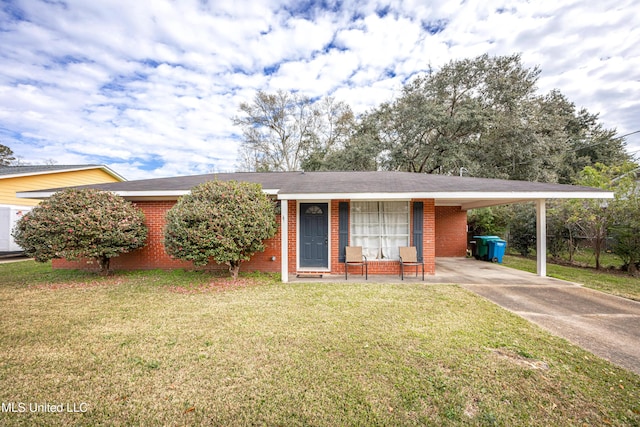 ranch-style house with a front yard and a carport