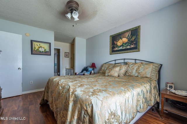 766 Whitney Dr, Biloxi, MS 39532 - bedroom featuring wood finished floors, a textured ceiling, and ceiling fan