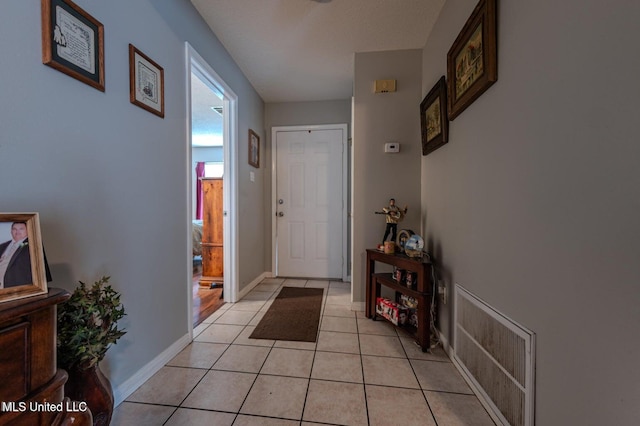 766 Whitney Dr, Biloxi, MS 39532 - entrance foyer with light tile patterned flooring and baseboards
