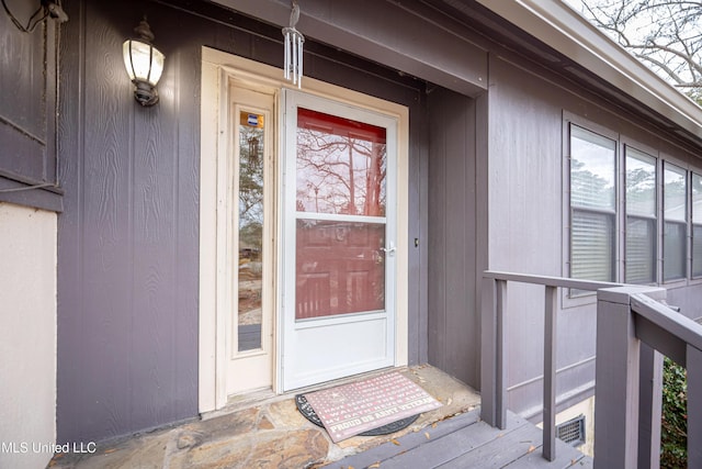 doorway to property featuring visible vents